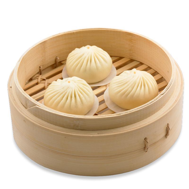 小籠包を箸で持ち上げた様子